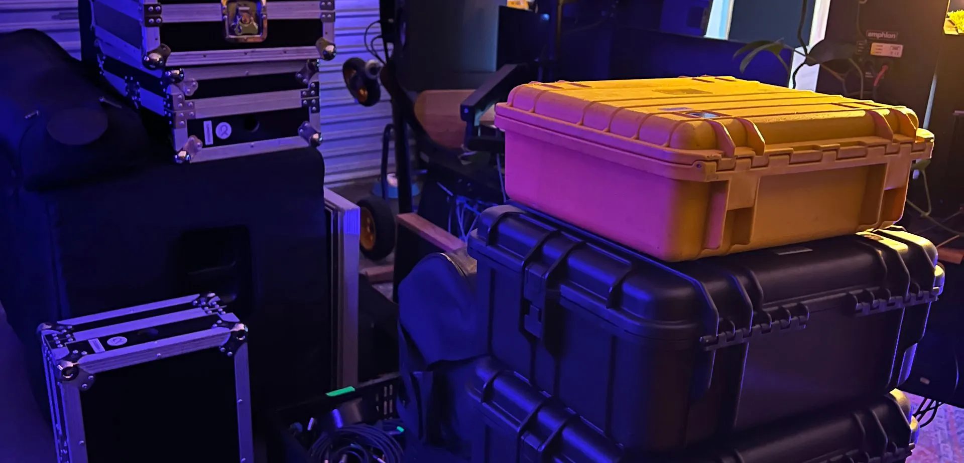 Speakers, Pelican cases and road cases packed and prepped for an audio hire