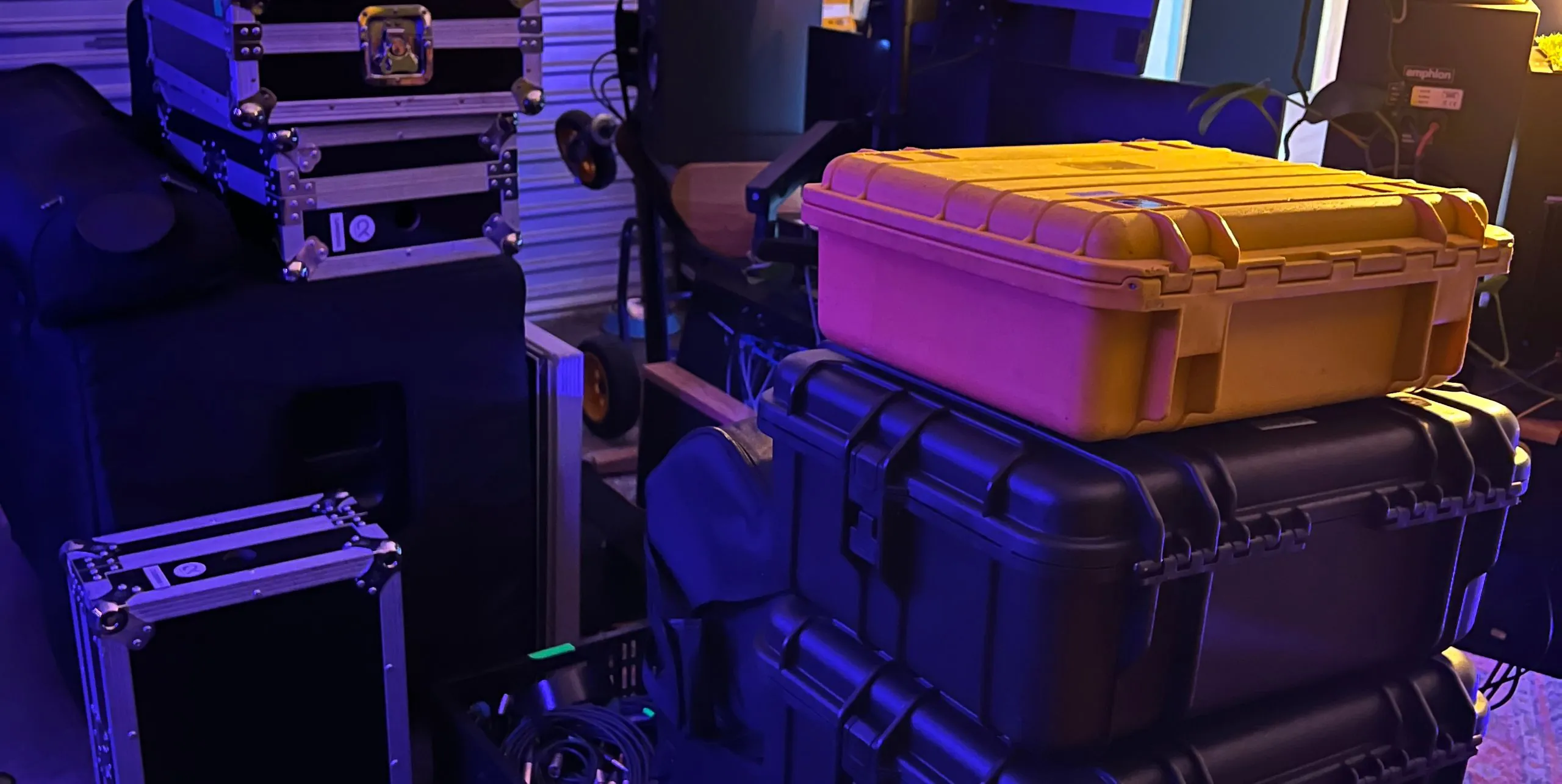 Speakers, Pelican cases and road cases packed and prepped for an audio hire