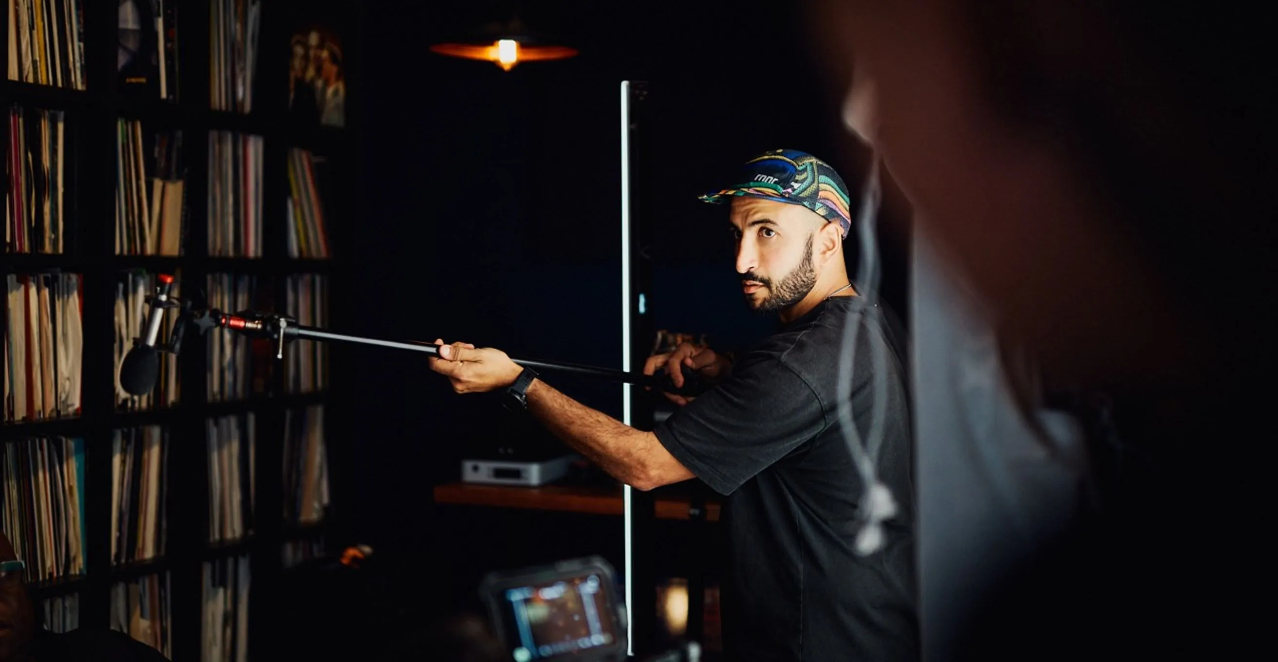 Mike Jaballah working as sound recordist on a Carl Cox shoot in Melbourne
